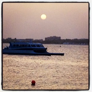 boat in the setting sun.